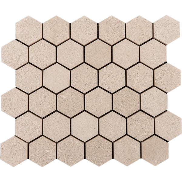 Detailed top view of 2-inch beige limestone hexagon mosaic tile with honed matte finish and mesh-backed sheet.