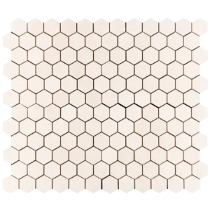 Top view of 2-inch honed limestone honeycomb mosaic tile sheet in soft beige with hexagon layout for bathroom and backsplash use.