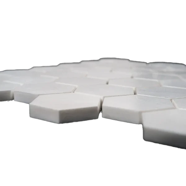 Side view of 2-inch polished Dolomite marble hexagon mosaic tile showing thickness