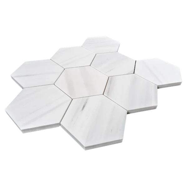 Angled view of 4-inch honed Dolomite honeycomb mosaic tile sheet with white marble hexagon pieces and soft matte finish.