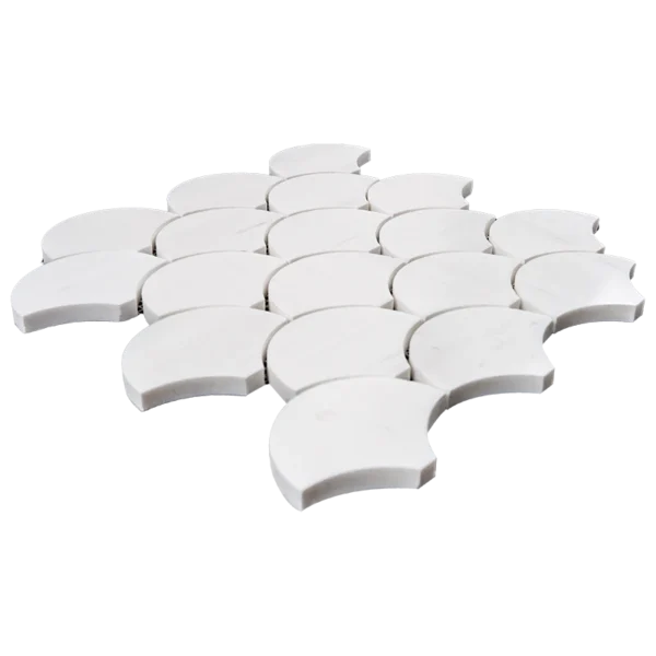 Angled view of Dolomite marble fish scale mosaic tile in polished white finish, highlighting the curved shapes and smooth surface texture.