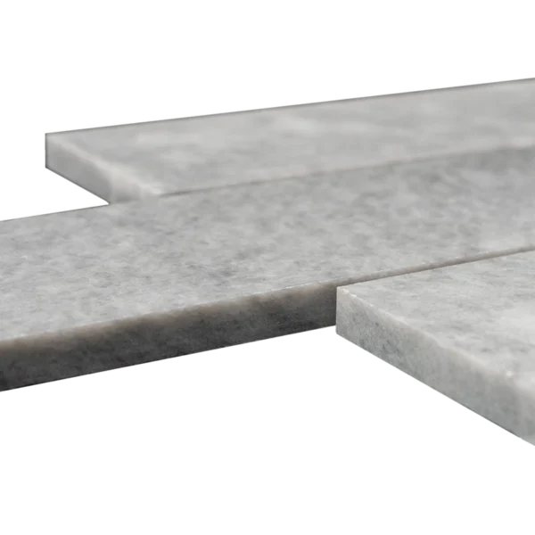 Close-up angle of Bardiglio 3x12 polished marble tile showing straight detail and smooth surface