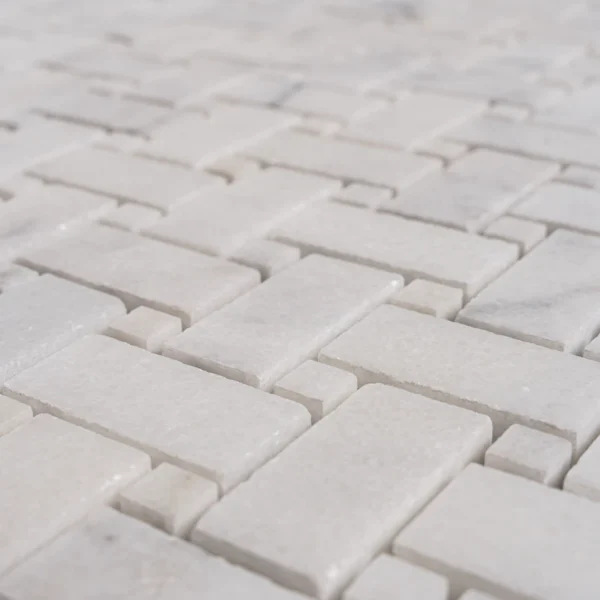 Close-up image of Milas honed marble basketweave mosaic tile highlighting its soft white tones and delicate veining.
