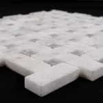 Detailed image of gray honed basketweave mosaic tile with subtle veining and geometric arrangement.