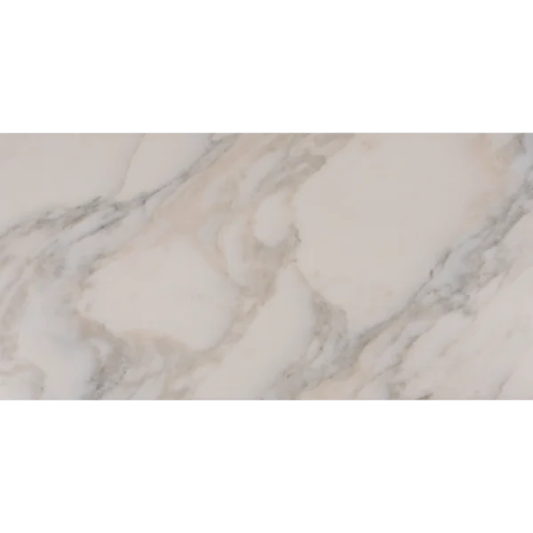 Flat lay of Calacatta honed marble tile with natural warm tones and cloud-like veining movement.