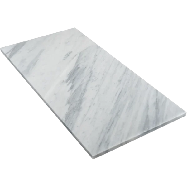 Angled perspective of a single Carrara honed marble tile highlighting the sleek honed surface and rectangular shape.