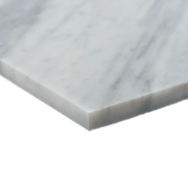 Detailed corner view of Carrara honed marble tile emphasizing its honed texture and clean-cut edges.