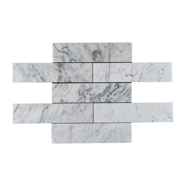 Carrara marble 3x12 tile layout showing polished surface and veining variation