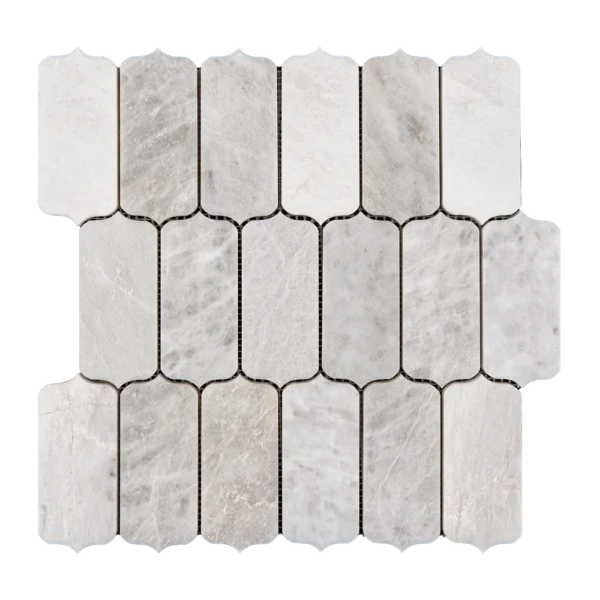 Dorema Dolomite marble mosaic sheet showing uniform rectangular tiles with curved edges, aligned horizontally and vertically in a consistent pattern. The surface displays soft grayish veins and a polished finish.