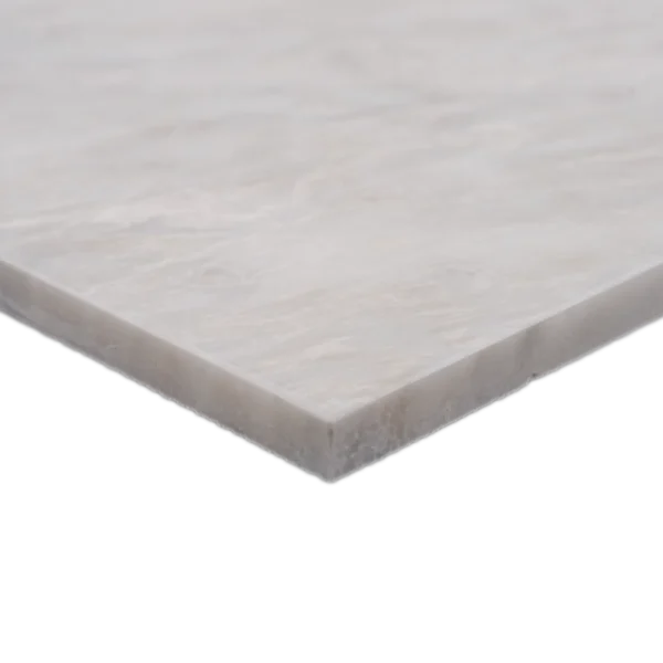 Beveled edge close-up of 12x12 Iceberg honed marble tile – subtle natural veining