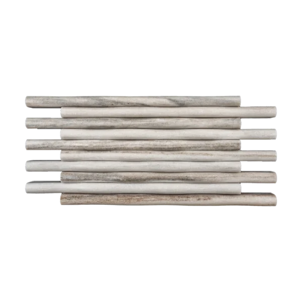 Horizontal arrangement of Lilium Palissandro marble rods showing consistent spacing and warm gray veining.