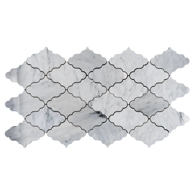 Overhead view of OLEA marble mosaic tile sheet in white Carrara, showing symmetrical interlocking design.