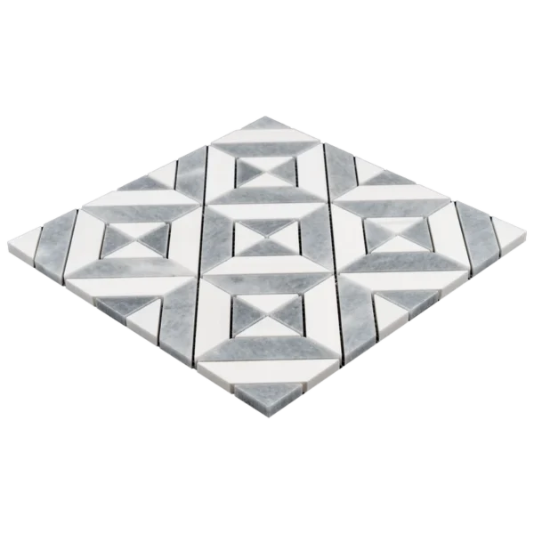 Close-up perspective showing the three-dimensional aspect of the geometric mosaic tiles, with raised white and gray marble pieces and clean lines.