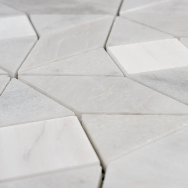 Center-focused image highlighting the diamond star pattern of Trillium mosaic tile, blending crisp white and soft gray marble tones.