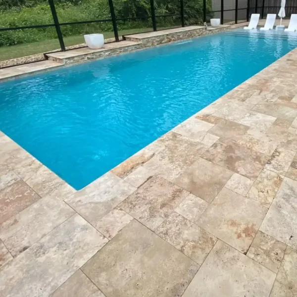 Country Classic travertine pavers — warm beige tumbled finish for patios and pool decks