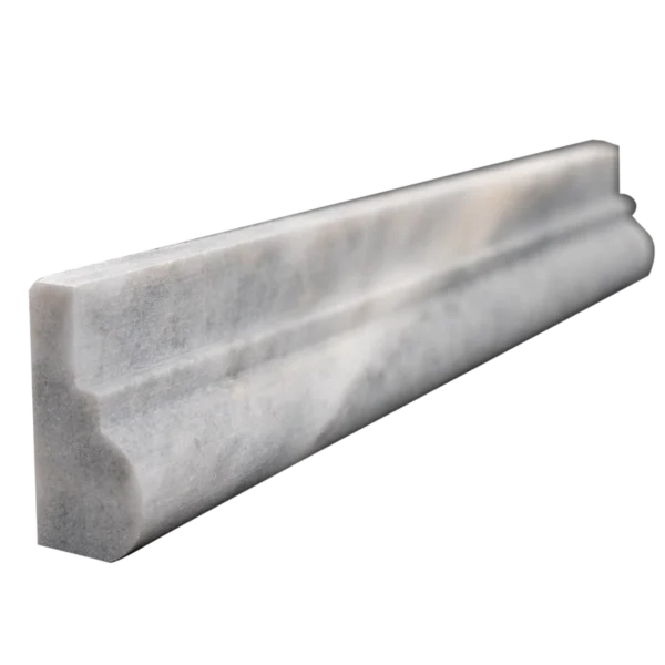Angled perspective of Bardiglio marble chair rail showing smooth honed finish and beveled detailing