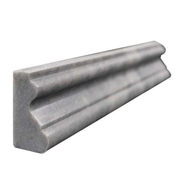 Close-up of Bardiglio marble chair rail end – honed edge and veining detail