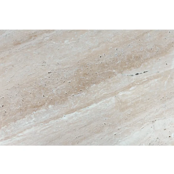 Full view of Desert Bloom 16"x24" tumbled travertine paver showing warm beige and cream tones with natural veining, ideal for outdoor patios, pool decks, and pathways