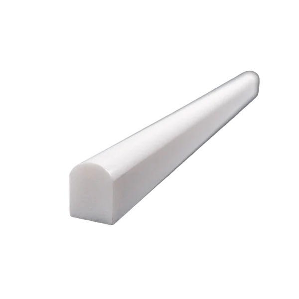 Close-up angle of polished Dolomite pencil liner molding with a smooth rounded edge in white marble