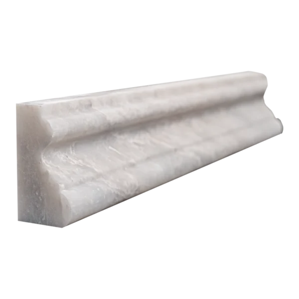 Close-up profile of the Iceberg marble crown molding, highlighting its carved structure and smooth finish.