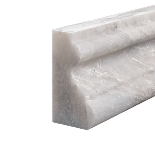 Close-up profile of the Iceberg marble crown molding, highlighting its carved structure and smooth finish.