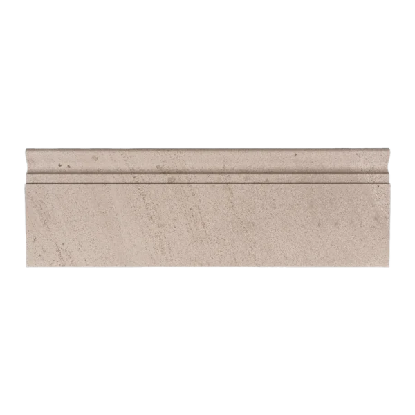 Straight-on image of honed limestone baseboard trim in beige tone with a defined molding edge.
