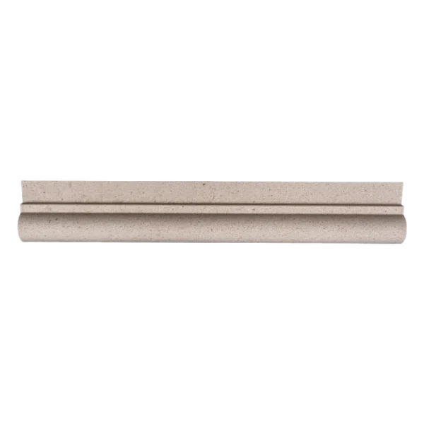 Straight-on view of honed limestone chair rail trim in warm beige color with elegant bullnose curve