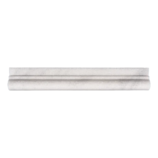 Frontal view of Milas marble chair rail molding with soft veining and honed finish.