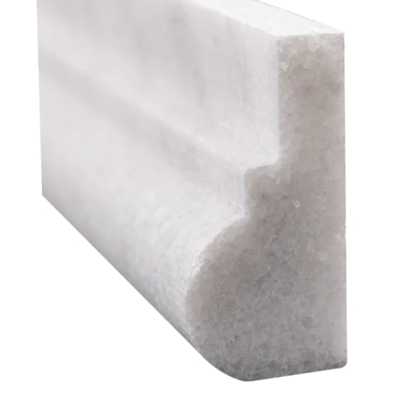 Detailed edge shot emphasizing the contour and smooth surface of the Milas marble molding.