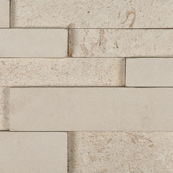 Beige Myra Shell 6x24 3D limestone ledgestone panel with sandblasted and textured finish