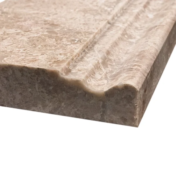 Close-up of Royal Beige polished marble baseboard trim – natural stone molding with warm beige veining and glossy finish