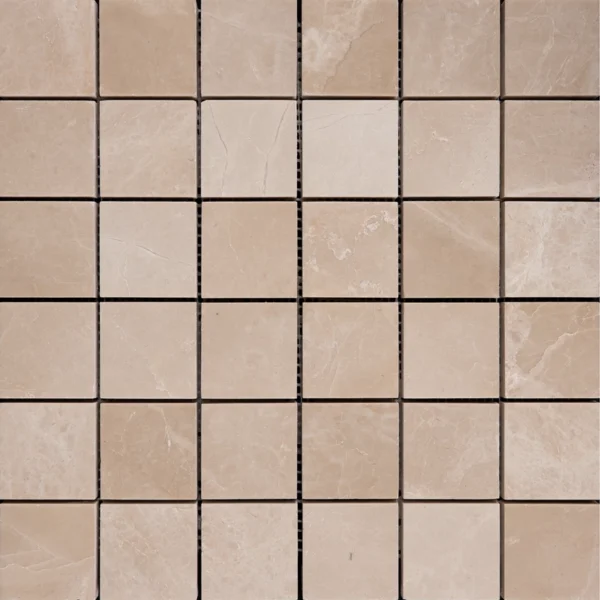 Smaller sheet of Botticino 2x2 polished marble mosaic tiles arranged in a square grid with visible natural stone variations.