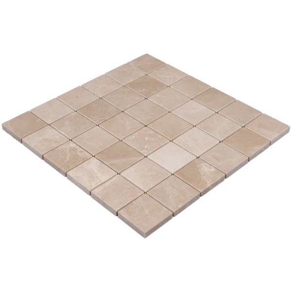 Angled overhead view of Botticino 2x2 polished marble mosaic tiles arranged in a flat square sheet.