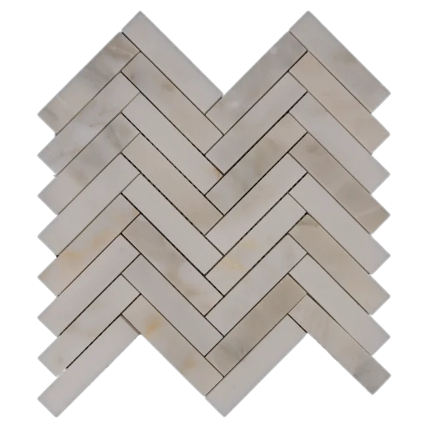Calacatta marble herringbone mosaic tile in 1x4 format, highlighting natural honed texture and subtle variation.