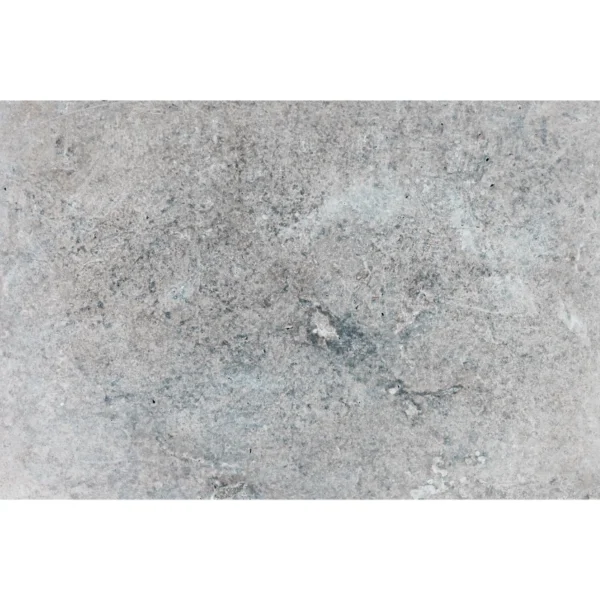 Charcoal 16"x24" tumbled travertine paver showcasing natural gray and blue-toned variations with a weathered, slip-resistant surface