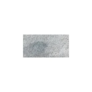 Close-up of Charcoal 6"x12" tumbled travertine paver showcasing its textured surface with natural gray tones and small pits, ideal for rustic outdoor applications.