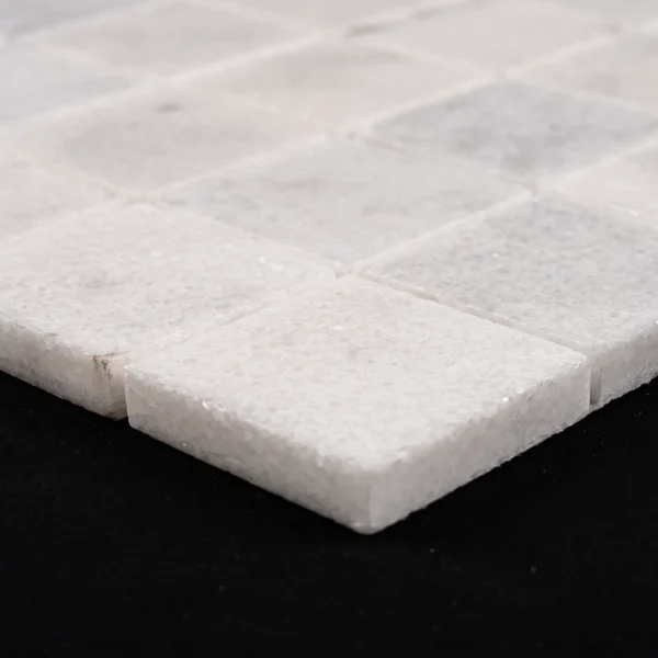 Side view of Milas White 2x2 polished marble mosaic tile sheet, showing tile thickness, clean edges, and polished surface.