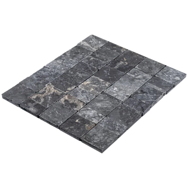 Angled perspective of the Pearl Black pixel mosaic showing tile thickness and tight grout joints across the sheet.
