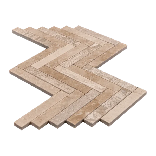 Angled view of Royal Beige 1x6 honed marble mosaic sheet in herringbone pattern, showing interlocking rectangular strips.