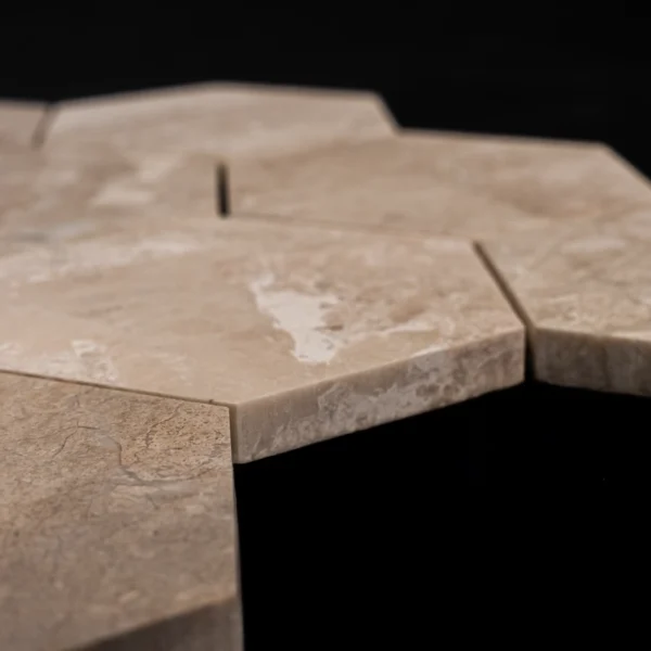 Side detail view of Royal Beige 4-inch honeycomb honed marble mosaic, showing tile thickness and smooth honed finish.