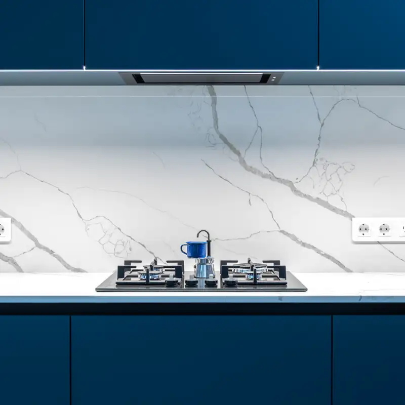 Honed Carrara White tile surface with matte finish