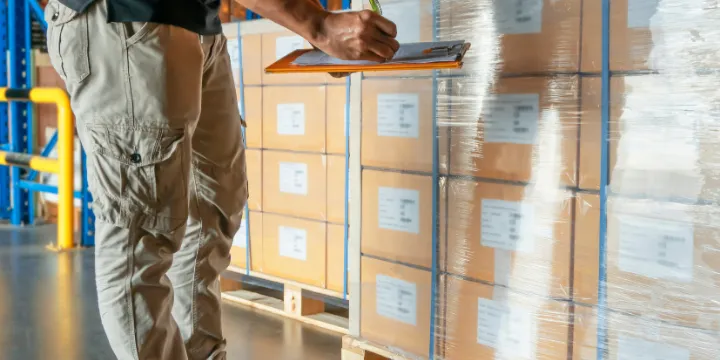warehouse-worker-holding-clipboard-is-inventory-cargo-products-warehouse stone market usa