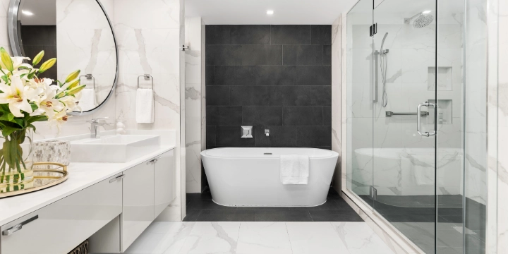 modern marble bathroom design in Naples Florida with natural stone tiles and shower