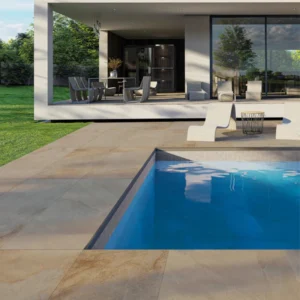 Berwyn Ivory 24x24 matte porcelain pavers installed around a modern swimming pool patio