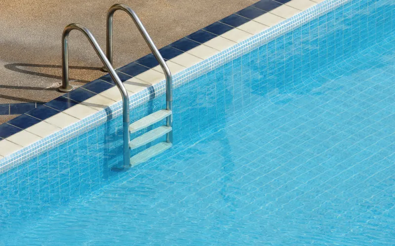 Luxury pool glass mosaic tiles with elegant blue waterline design