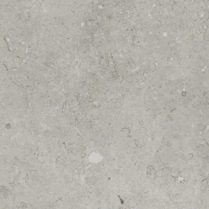 Coralina Perla 24x24 2CM Porcelain Paver installed in a modern bedroom featuring a soft gray limestone-look porcelain floor with a natural finish.