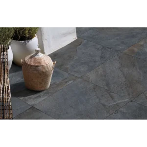 Outdoor patio layout featuring Berwyn Bluestone 24x24 porcelain pavers in a natural finish creating clean, modern lines.