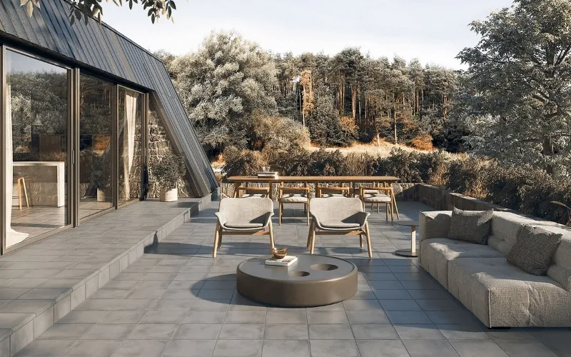 Gray marble pavers installed on a contemporary outdoor patio and deck