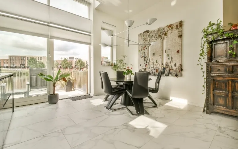 Modern interior featuring elegant honed marble tile flooring with a soft matte natural stone finish