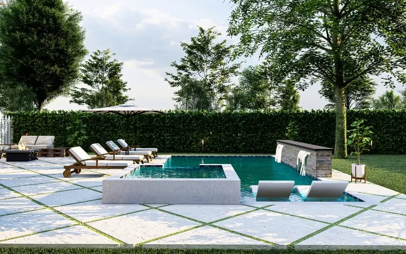 White marble pavers installed on a bright outdoor pool deck and patio